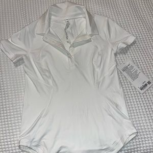 Lulu / Lululemon White Golf Polo. Brand new with tags Size 2